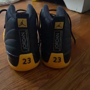 Black and. Yellow. Jordan 23 size 9 in men’s